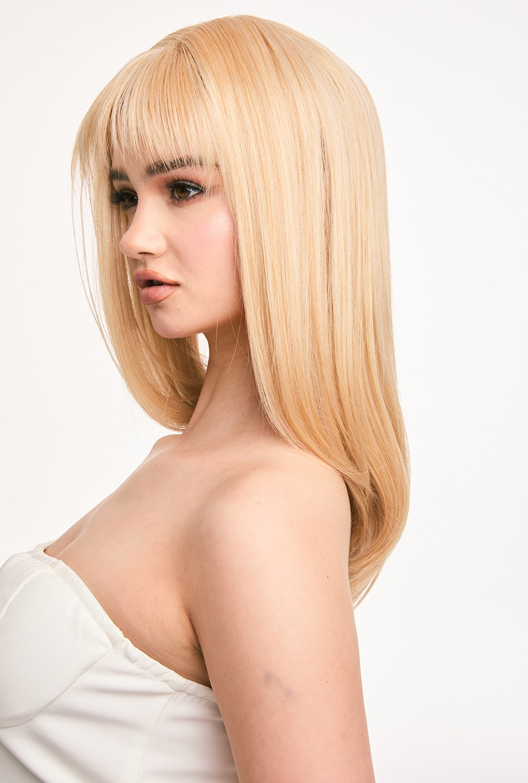 Eilis | Blonde Synthetic Wig with Layered Style & Airy Bangs - Ailsa's Wigs