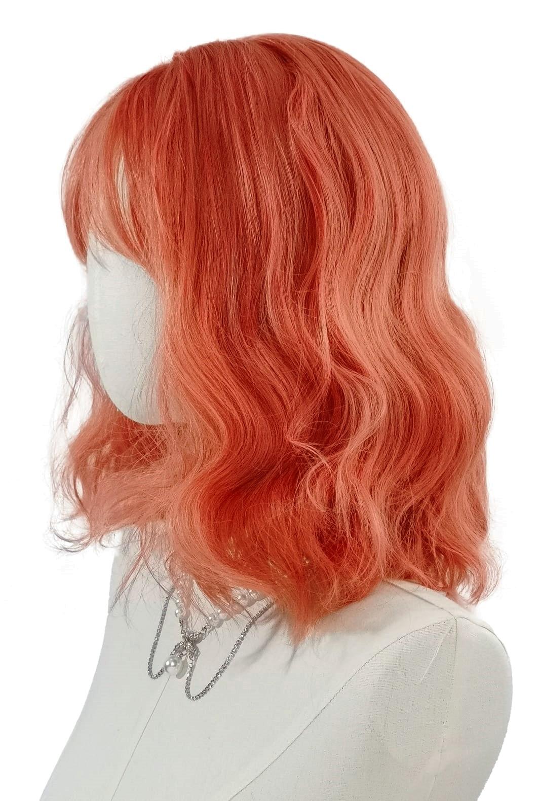 Coral | Playful Peach Curly Bob Synthetic Wig - Ailsa's Wigs